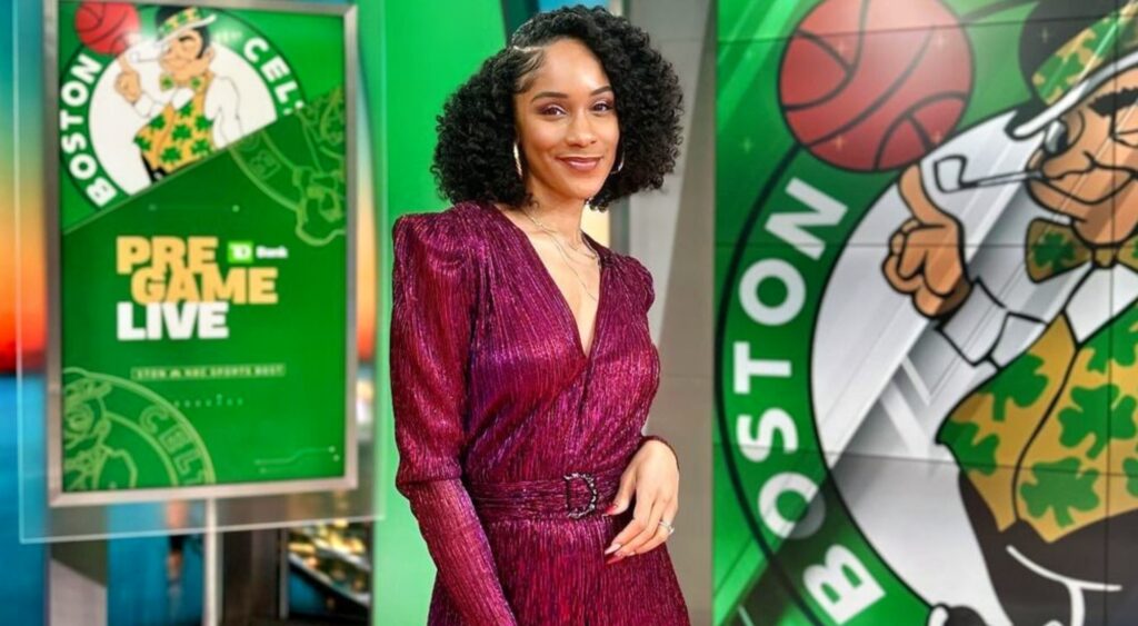 Amina Smith posing with Celtics background