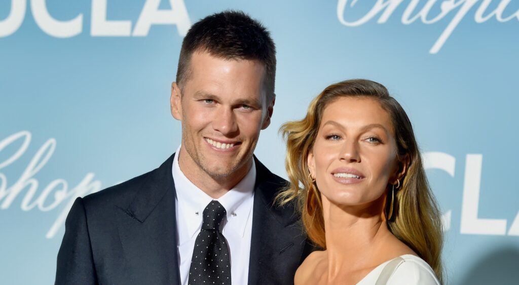 Tom Brady (left) and Gisele Bündchen (right) smiling at event.