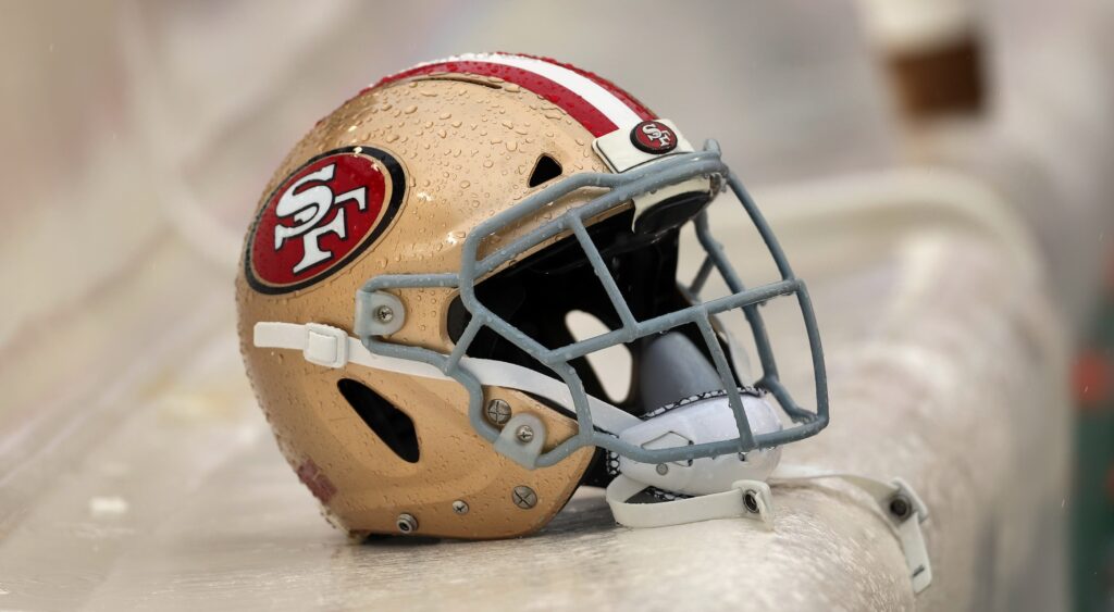 San Francisco 49ers helmet shown on bench.
