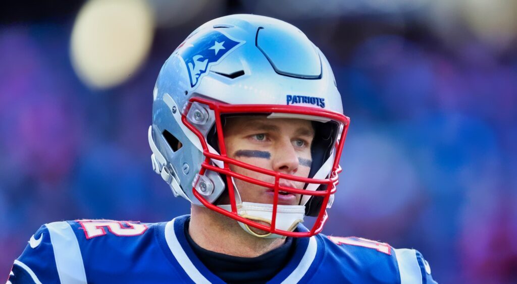 Tom Brady of New England Patriots looking on.