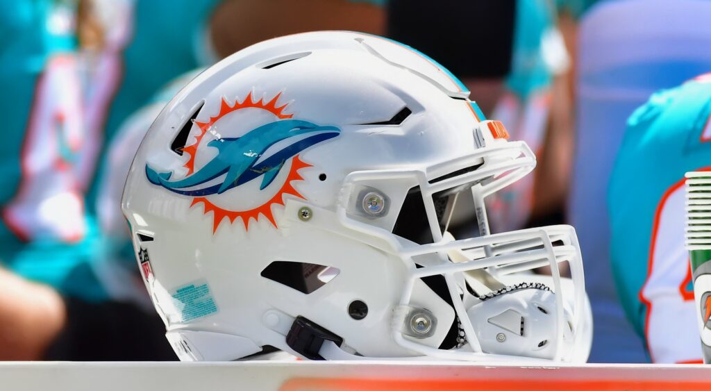 Miami Dolphins helmet shown on sidelines.