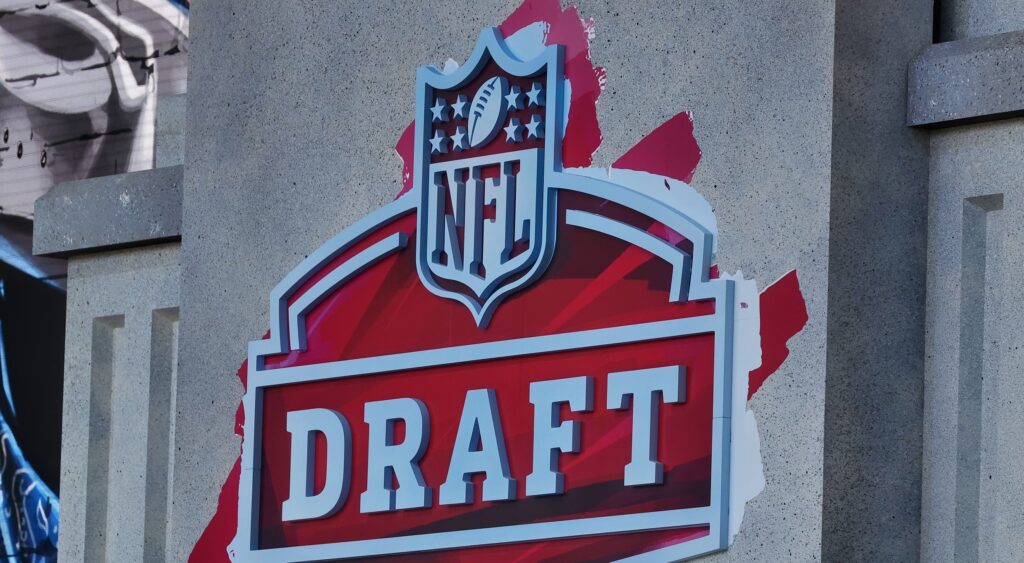 NFL Draft logo shown on wall.