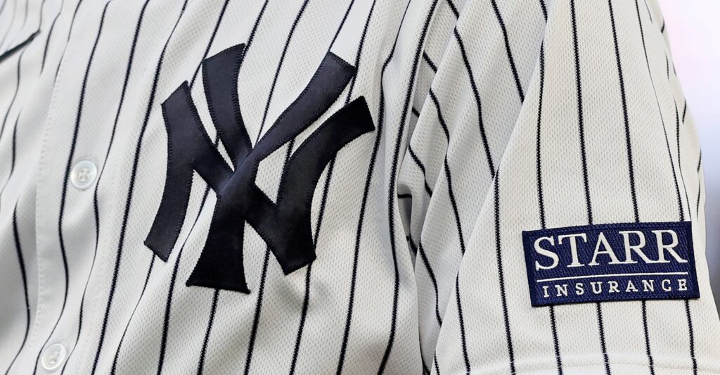 New York Yankees logo shown on jersey.