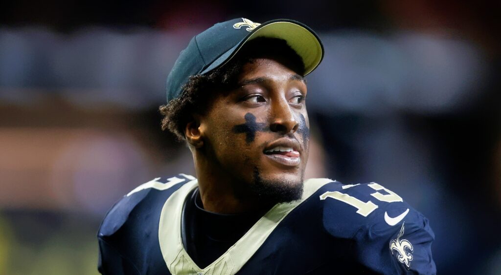 Michael Thomas of New Orleans Saints looking on.