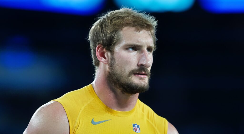 Joey Bosa of Los Angeles Chargers looking on.