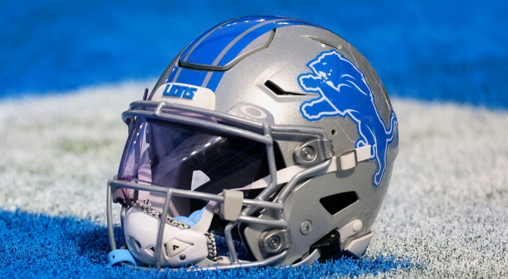 Detroit Lions helmet shown on field.