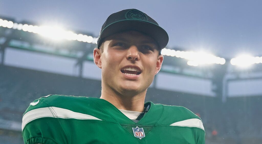 Zach Wilson of New York Jets looking on.
