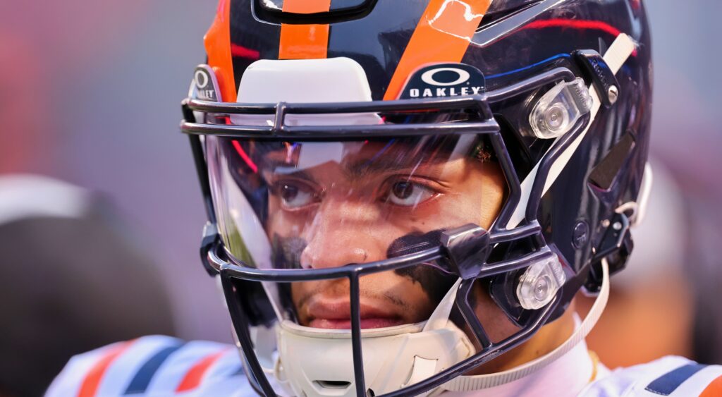 Justin Fields of Chicago Bears looking on.