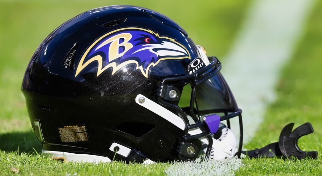 Baltimore Ravens helmet shown on field.
