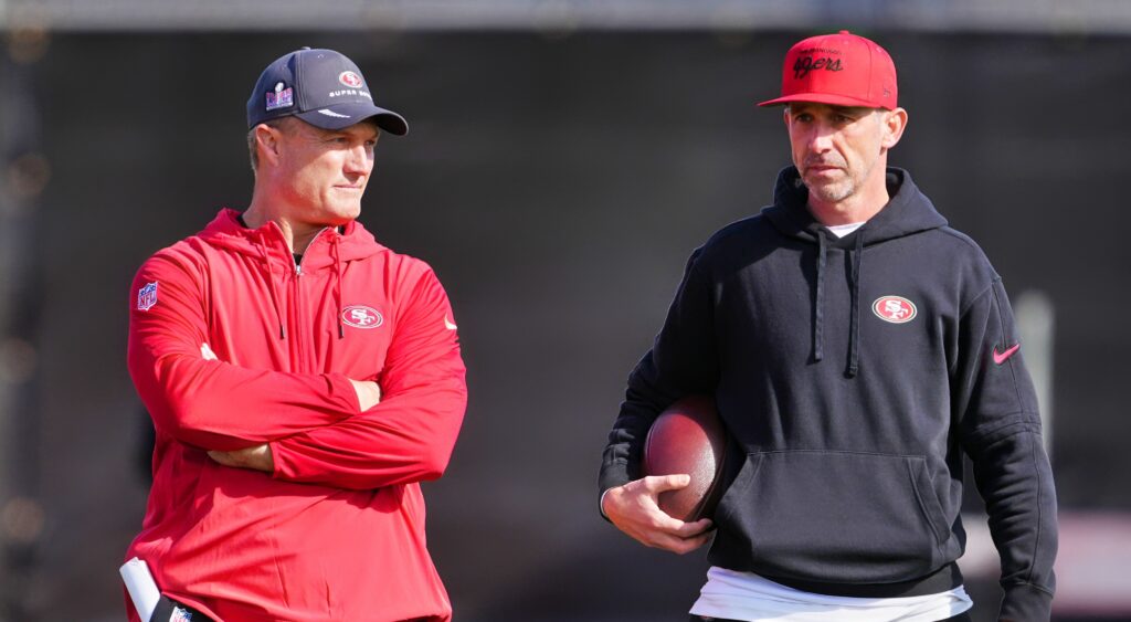 San Francisco 49ers GM John Lynch (left) and head coach Kyle Shanahan (right) looking on.