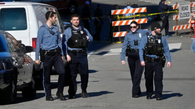 Police officers patrol area in Kansas City after parade shooting