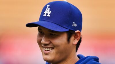 ShoHei Ohtani smiling in Dodgers gear
