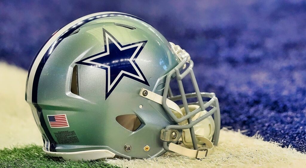 Dallas Cowboys helmet shown on field.