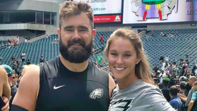 Jason Kelce posing with his wife Kylie