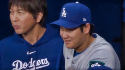 shohei ohtani and his friend in Dodgers dugout
