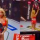 Ali Heibati and ring card girl Maria in MMA octagon