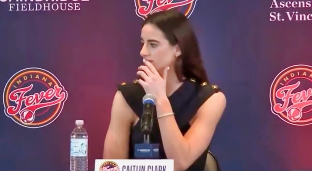 Caitlin Clark fields a question at her press conference.