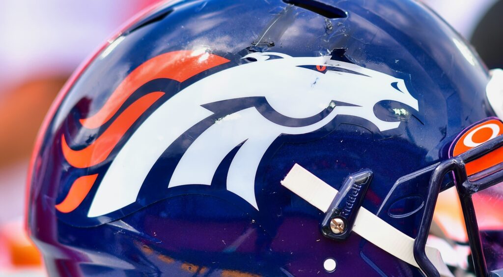 A closeup of the Denver Broncos' logo on their helmet.