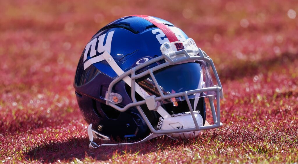 A New York Giants helmet on the field.