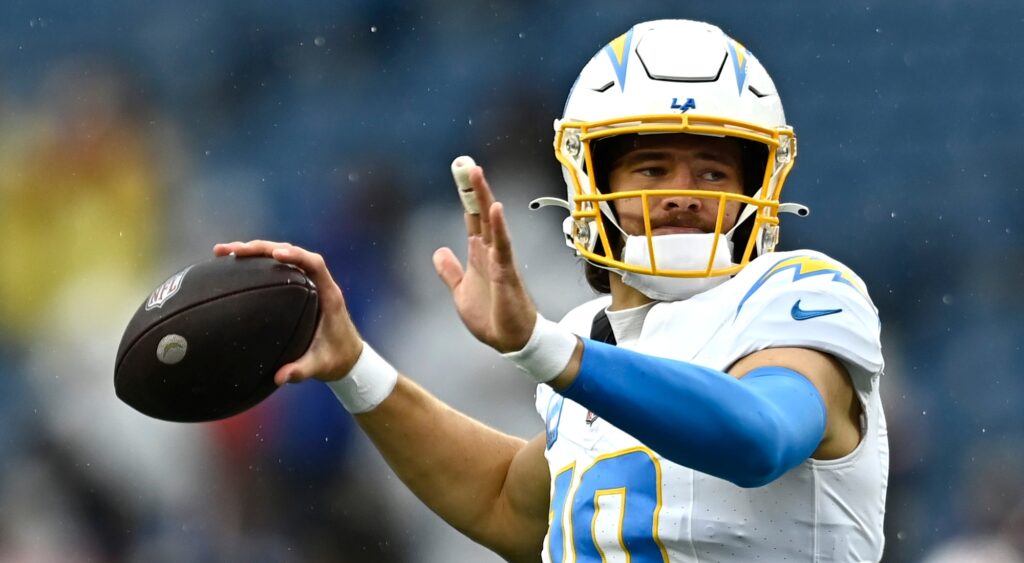 Los Angeles Chargers quarterback Justin Herbert warms up before a game against the New England Patriots