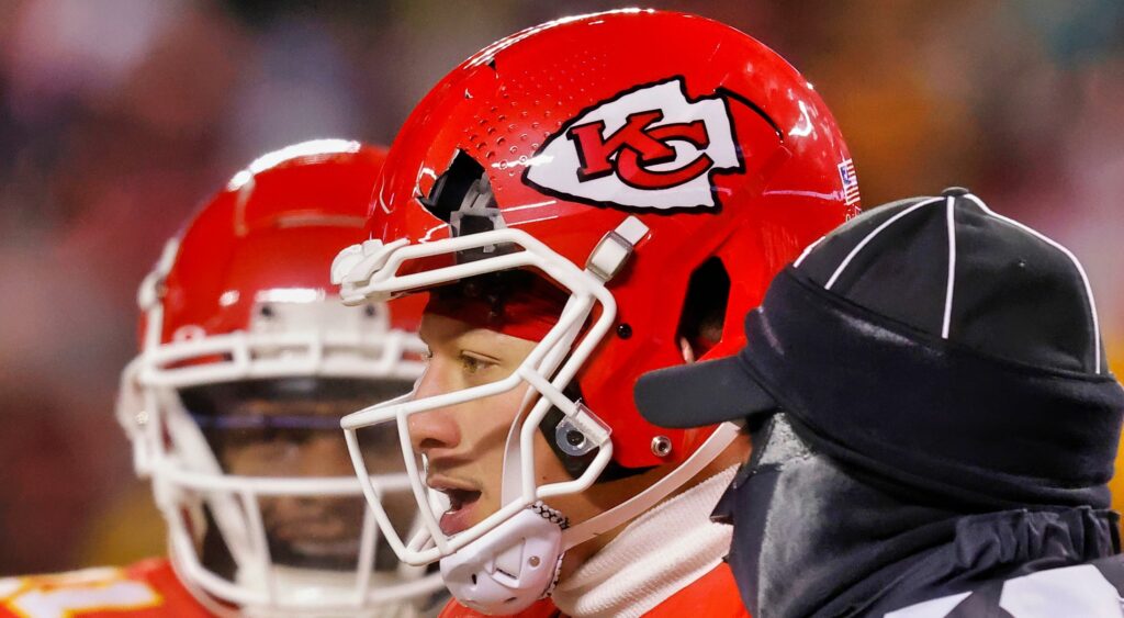 NFL star Patrick Mahomes with a crack in his helmet.