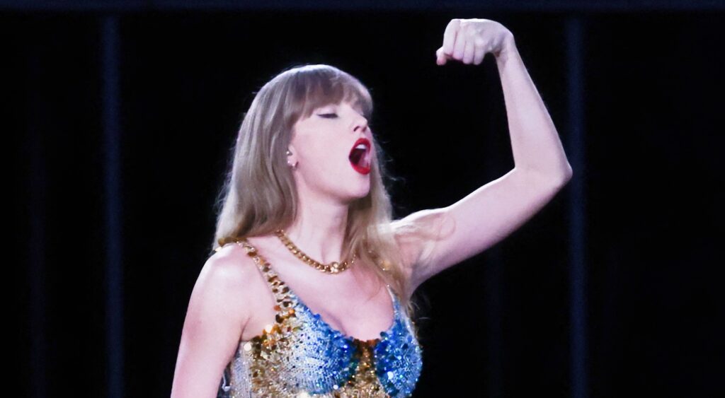 Taylor Swift reacting during performance.