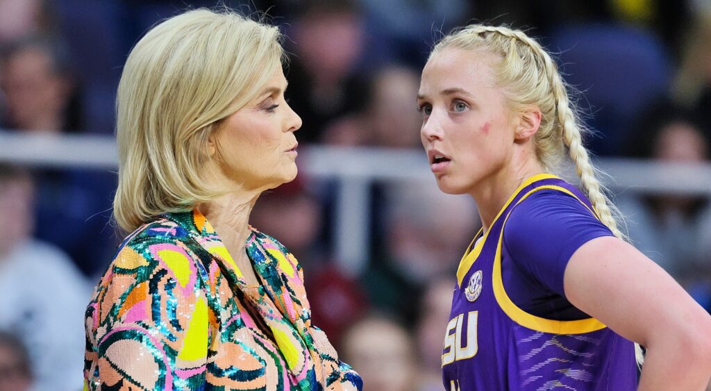 Kim Mulkey talks to Hailey Van Lith during a break in the game.