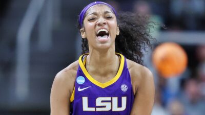 Angel Reese in LSU uniform and yelling
