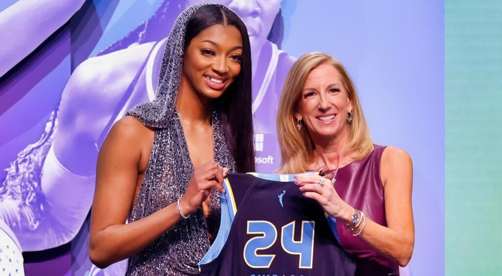 Angel Reese and WNBA commissioner at the Draft