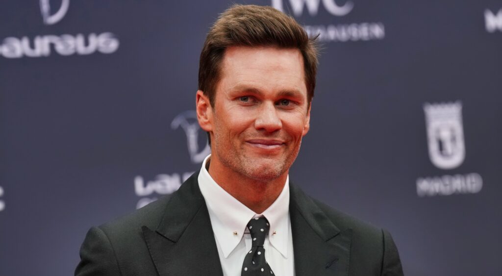 Tom Brady poses on the red carpet.