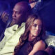 Michael Jordan sitting next to his wife