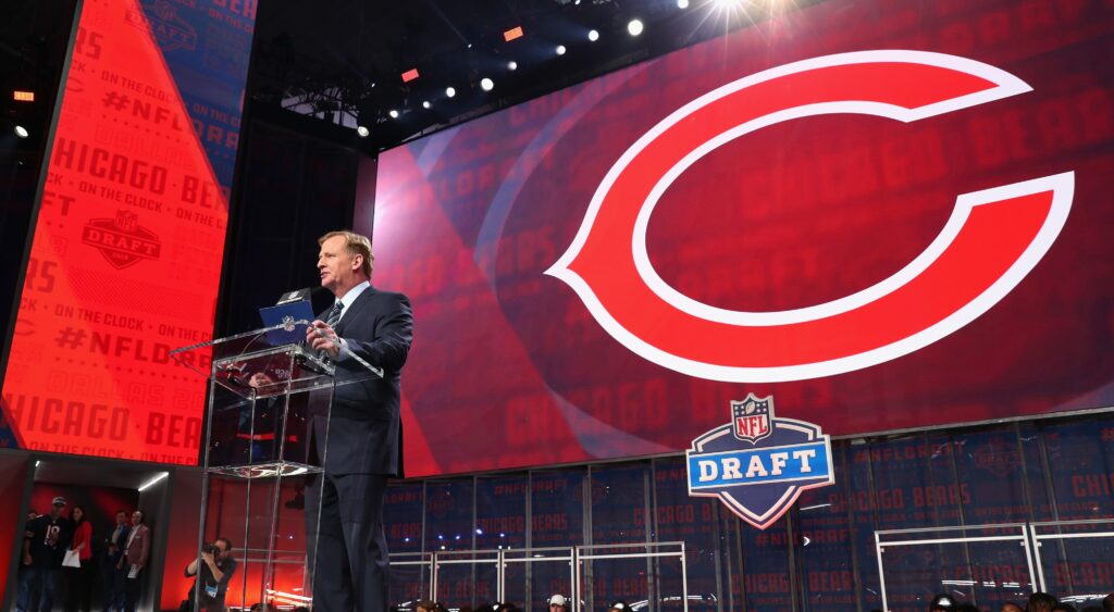 Roger Goodell at the NFL Draft podium announcing the Chicago Bears' pick.