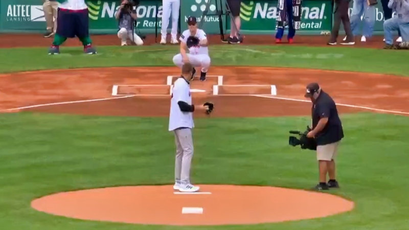 Rob Gronkowski throwing first pitch at Boston Red Sox game.