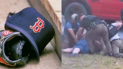 Austin Maddox being arrested by cops. Boston Red Sox cap on MLB glove.