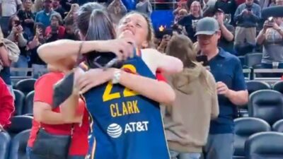 Caitlin Clark hugging woman