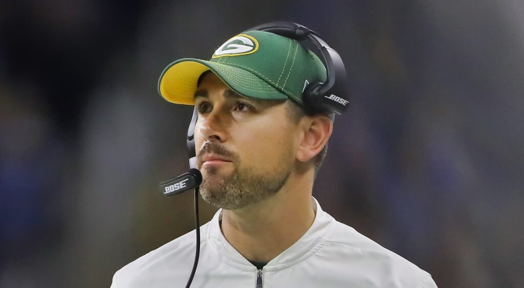 Green Bay Packers head coach Matt LaFleur looking on.