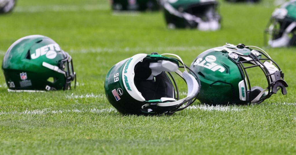 New York Jets helmets shown on field.