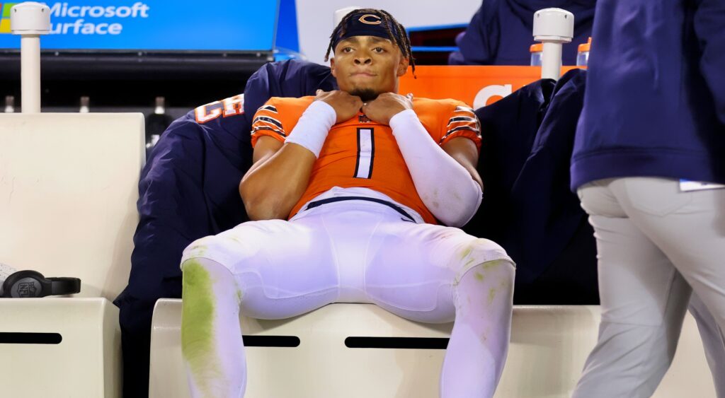 Former Chicago Bears quarterback Justin Fields sits on the bench.