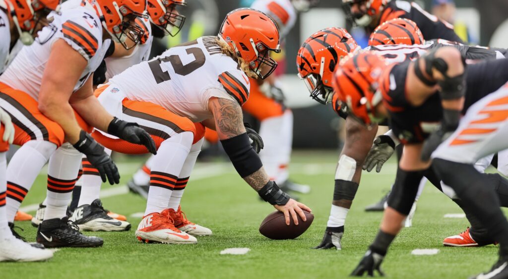 Cleveland Browns and Cincinnati Bengals players at line of scrimmage