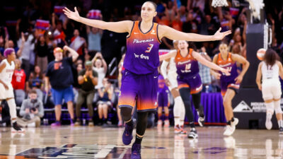 Diana Taurasi with her arms open