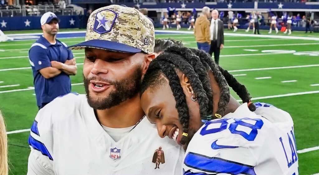 Ceedee Lamb hugs Dak Prescott after a Dallas Cowboys game.
