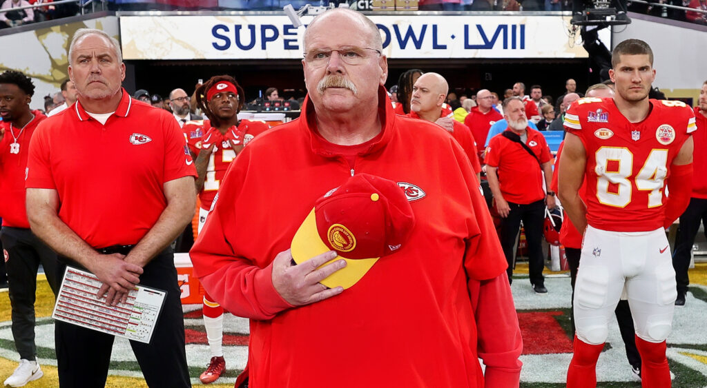Kansas City Chiefs head coach Andy Reid standing for the national anthem