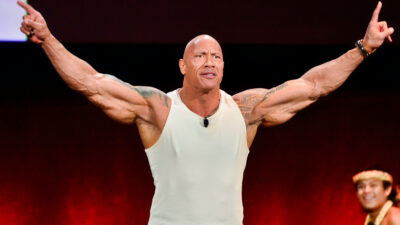 The Rock with his hands in the air