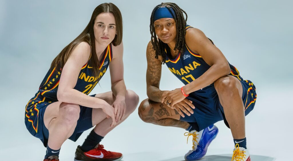 Caitlin Clark posing with teammate during photoshoot