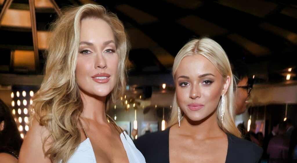 Paige Spiranac and Olivia Dunne pose together.