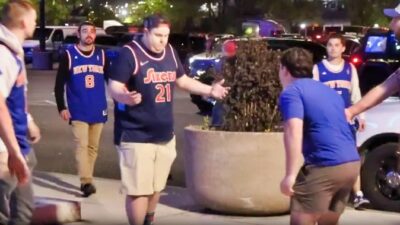 Knicks and 76ers fans outside arena