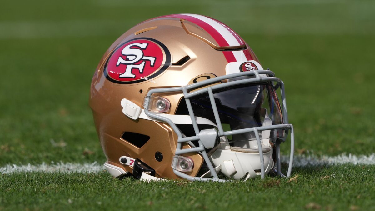 A San Francisco 49ers helmet sits on the field