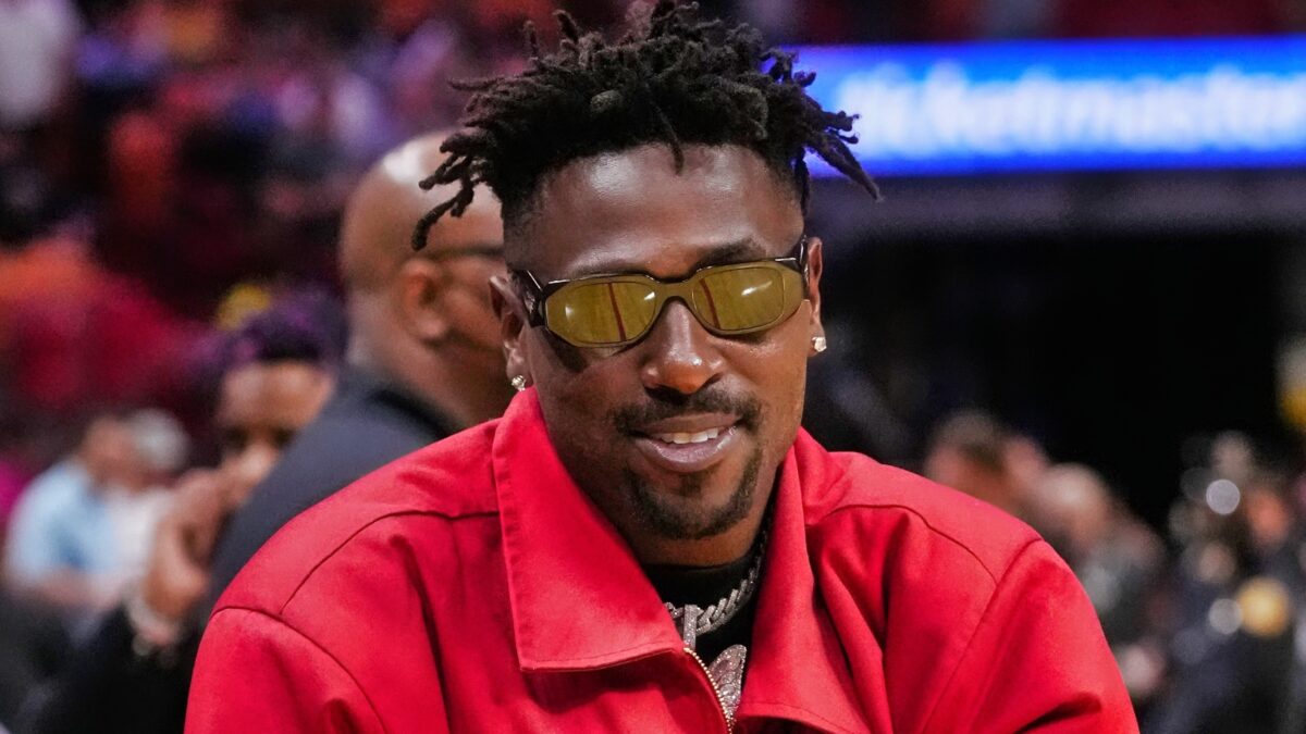 Antonio Brown in red suit