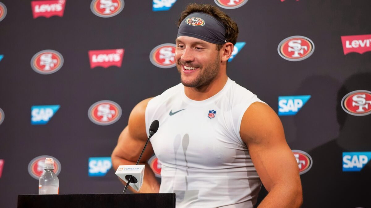 San Francisco 49ers defensive end Nick Bosa speaks to reporters