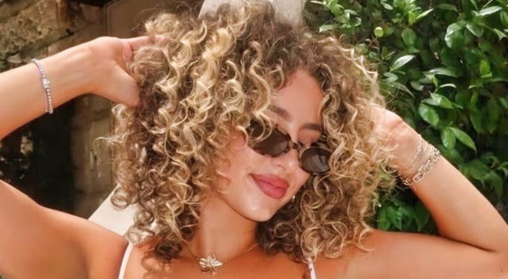 Gia Duddy posing in a bikini
